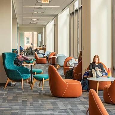 A seating area on the third floor of the Danielle Ripich Commons on the Biddeford Campus